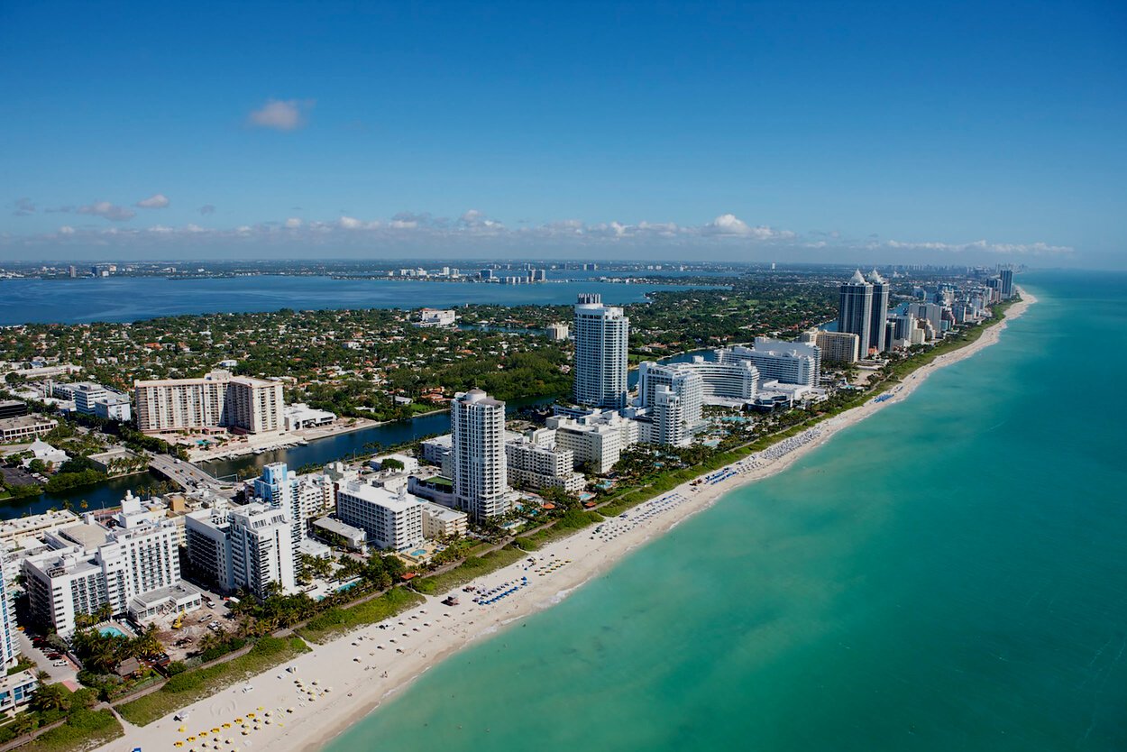 Aerial View of City Buildings Near Body of Water